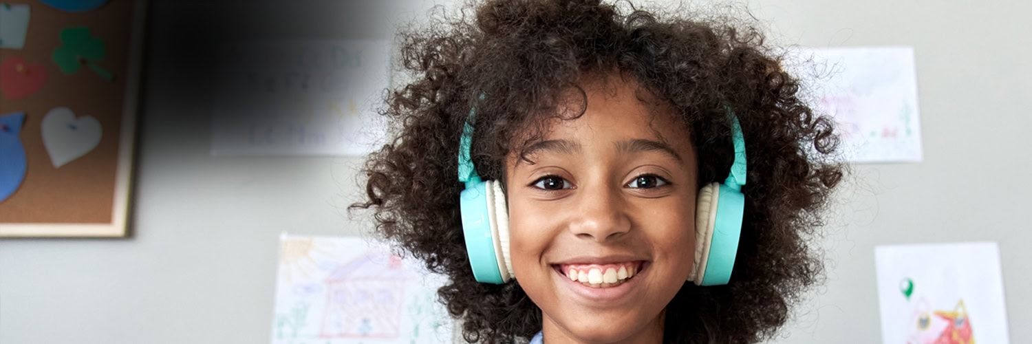 Grade 6 primary school girl with her headphones.