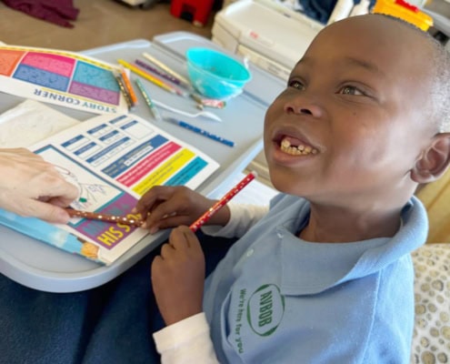 Primary school child participating in educational activities while in hospital.