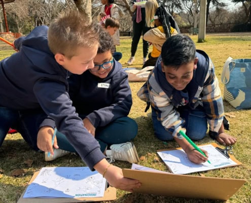 Grades 4, 5 and 6 students participating in activities during a field trip to the Johannesburg Zoo in 2024.